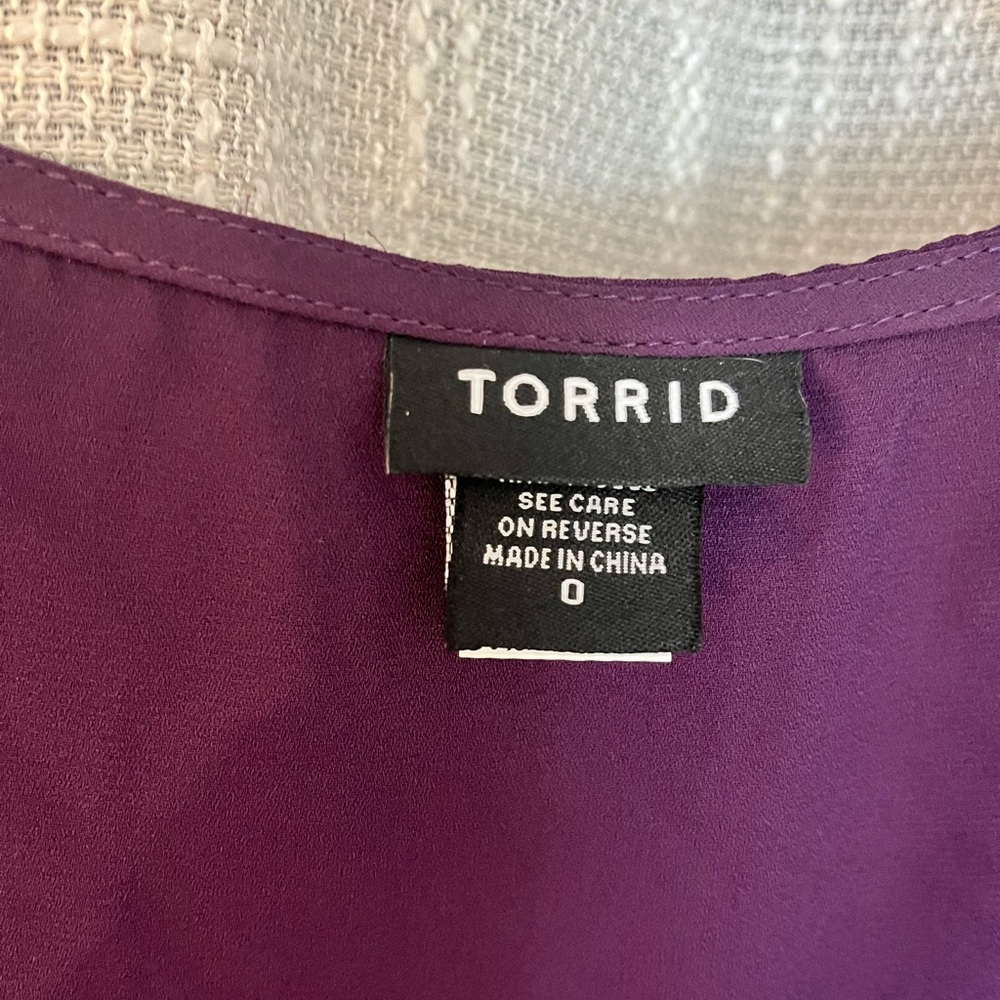 Plum sleeveless top from Torrid